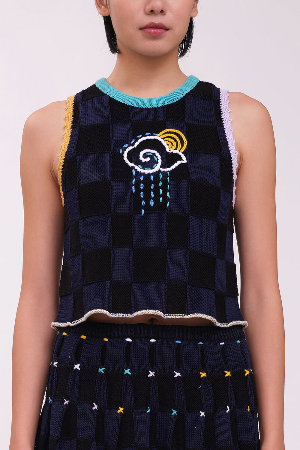 Plaited Check Tank